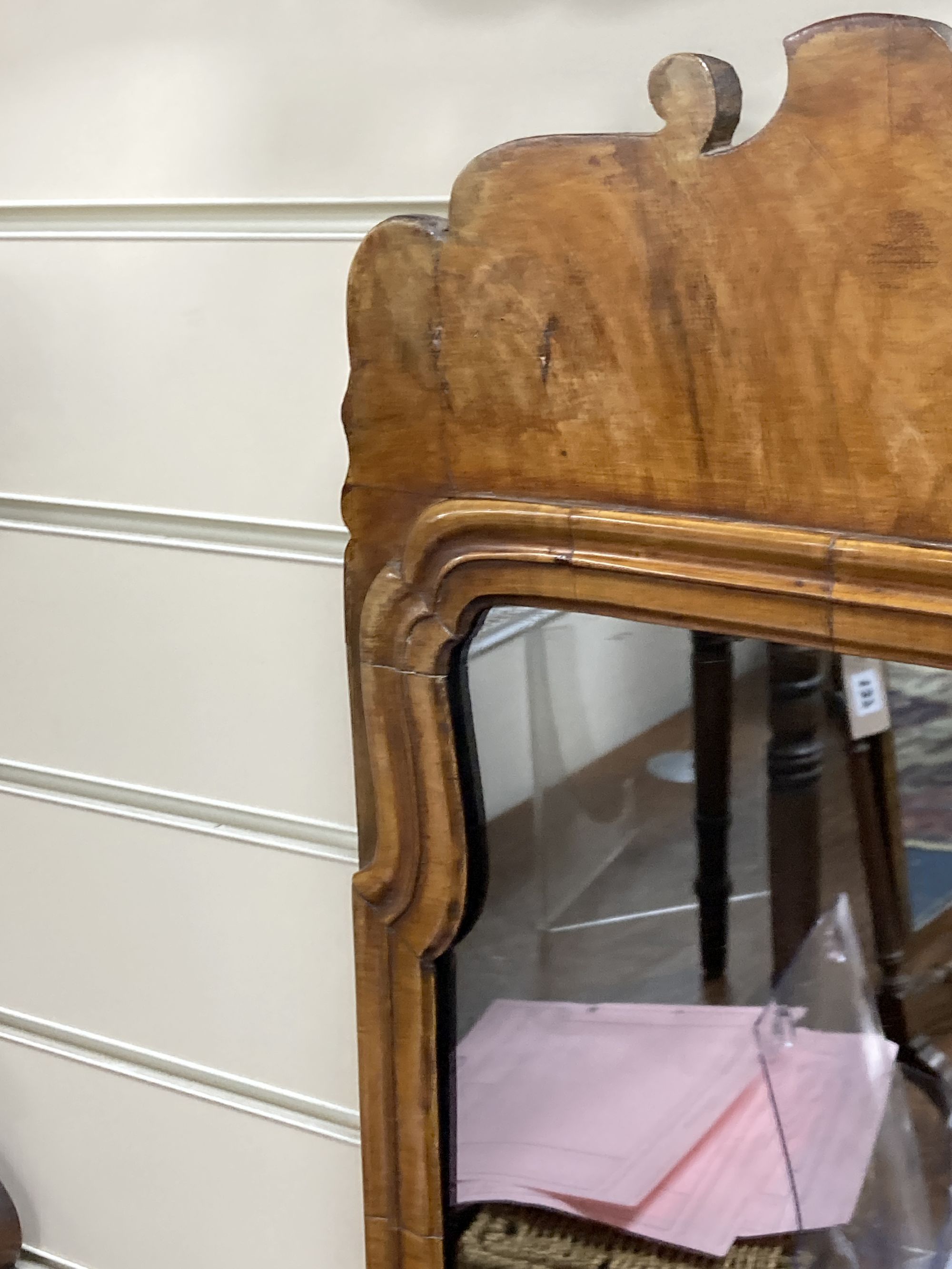 An 18th century walnut fret cut wall mirror, width 56cm, height 86cm